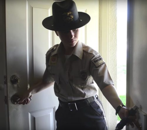 Officer Opening the Door