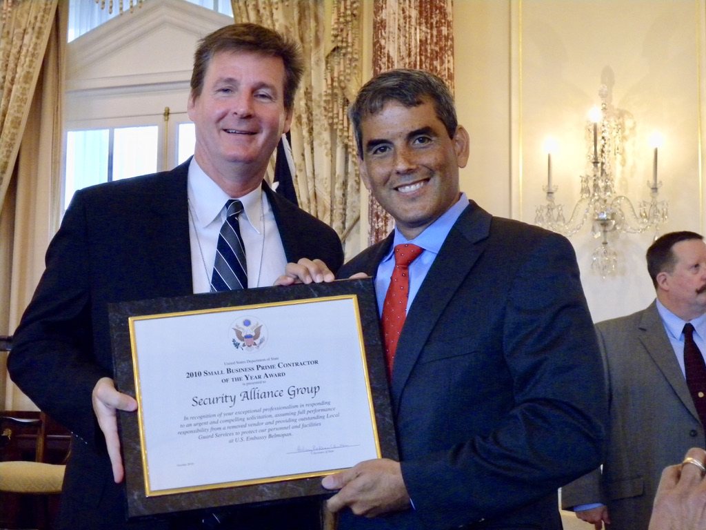 Security Alliance founder David Ramirez receiving the 2010 US Department of State Small Business Prime Contractor of the Year Award at the State Department