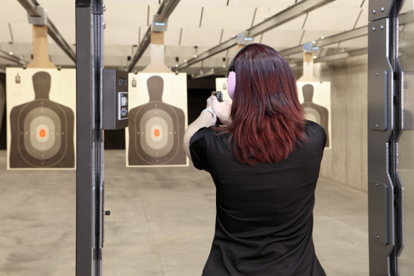 Female Trainee Learning to Shoot Handgun